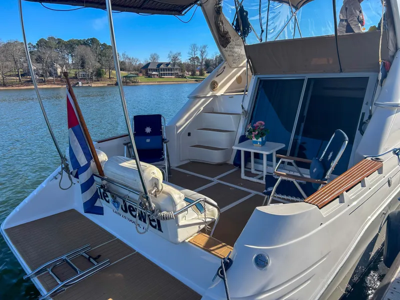 Slide: The Image of 1993 Sea Ray Express Bridge 350 on a tranquil lake. - 11
