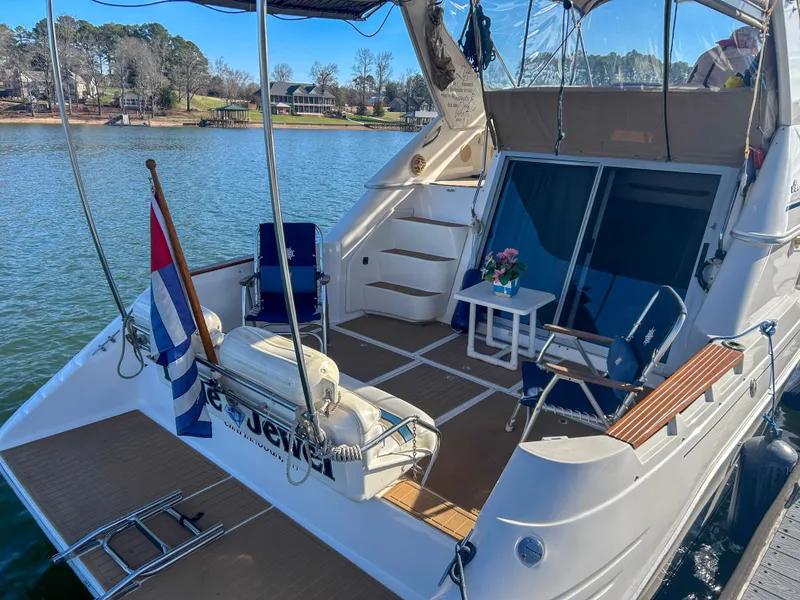 Slide: The Image of 1993 Sea Ray Express Bridge 350 on a tranquil lake. - 13