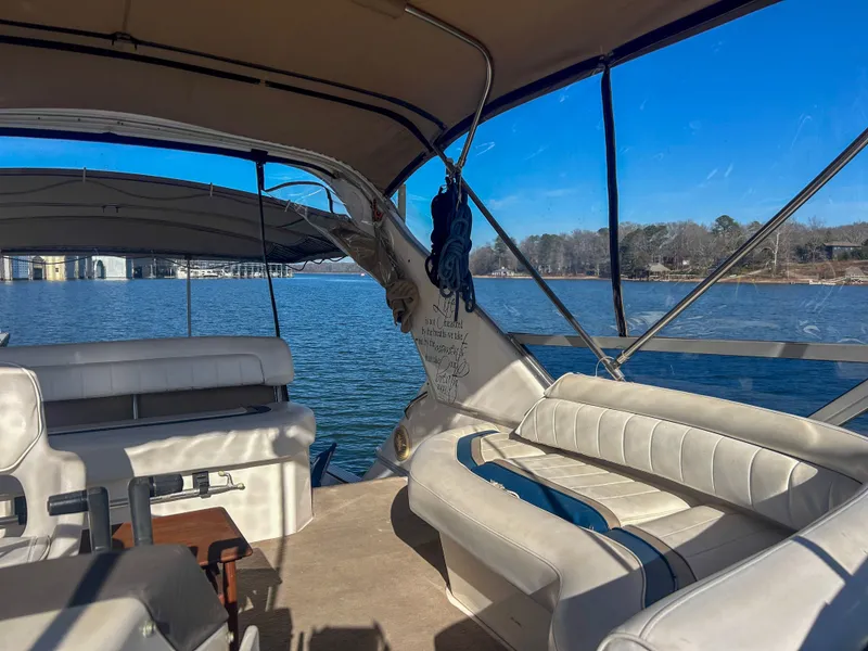 Slide: The Image of Interior of a 1993 Sea Ray Express Bridge 350 on a lake. - 19