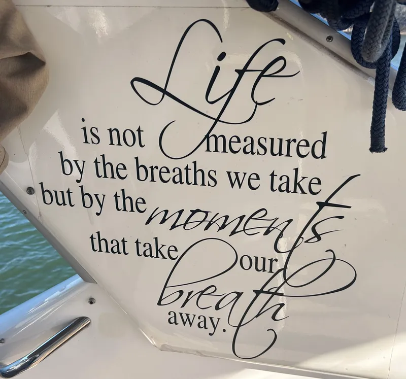 Slide: The Image of Inspirational quote on a 1993 Sea Ray Express Bridge 350 boat. - 20