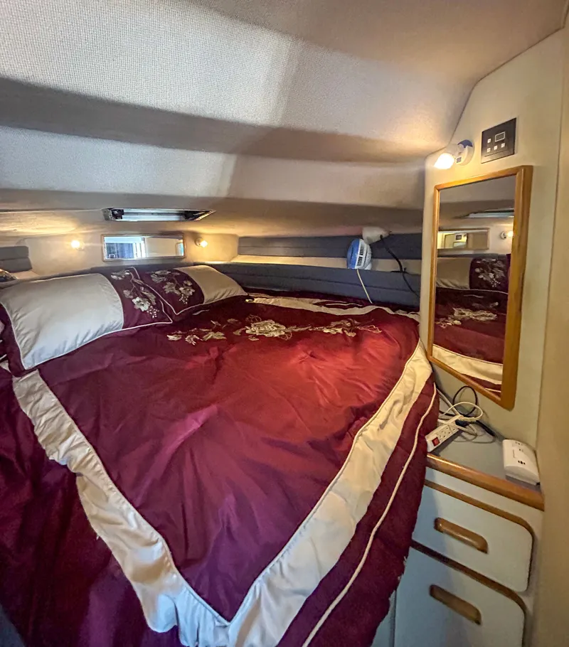 Slide: The Image of Interior of 1993 Sea Ray Express Bridge 350 with cozy bed. - 22