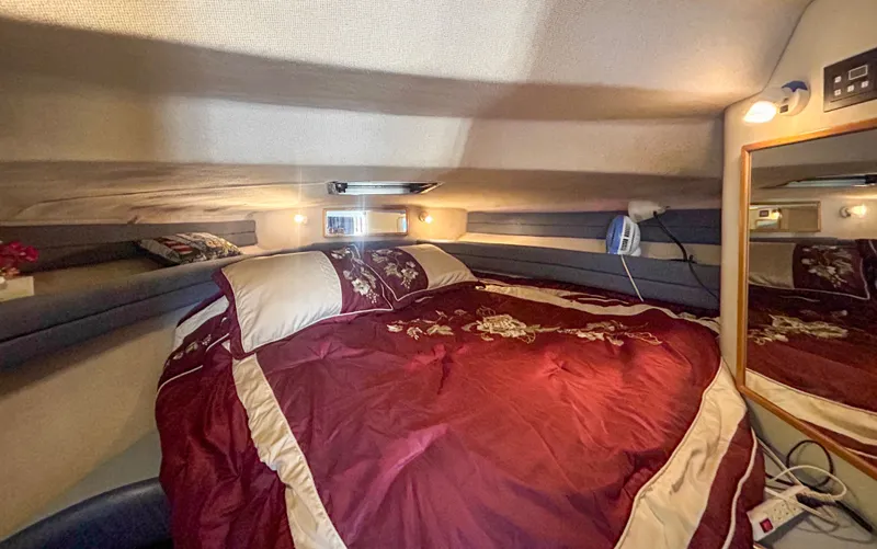 Slide: The Image of Interior of 1993 Sea Ray Express Bridge 350 with cozy bed. - 23