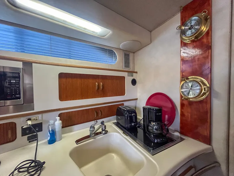 Slide: The Image of 1993 Sea Ray Express Bridge 350 kitchen area. - 25