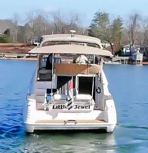 Slide: The Image of 1993 Sea Ray Express Bridge 350 on calm water. - 3