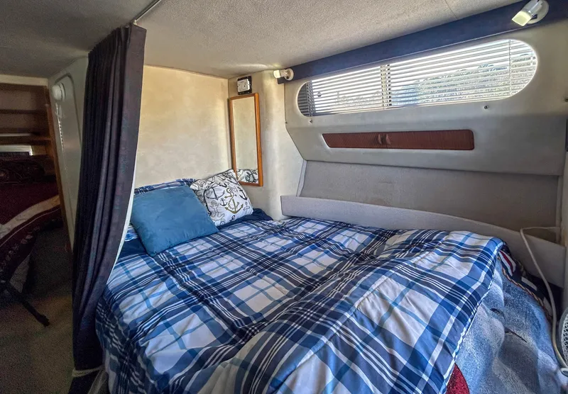 Slide: The Image of Interior of 1993 Sea Ray Express Bridge 350 with cozy bed. - 30