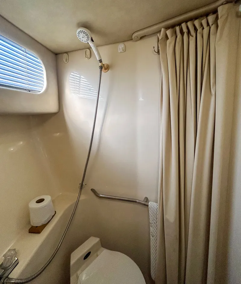 Slide: The Image of Bathroom of 1993 Sea Ray Express Bridge 350 yacht. - 38