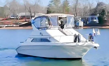 Slide: The Image of 1993 Sea Ray Express Bridge 350 on calm water. - 4