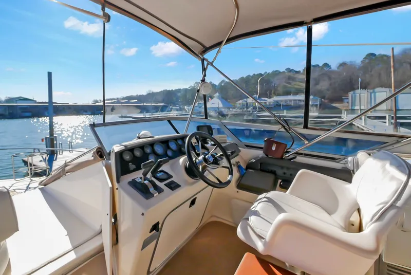 Slide: The Image of Interior of 1993 Sea Ray Express Bridge 350 at the marina. - 43