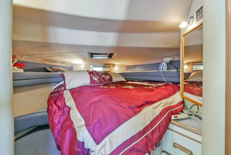 Slide: The Image of Luxurious bedroom in a 1993 Sea Ray Express Bridge 350 yacht. - 45