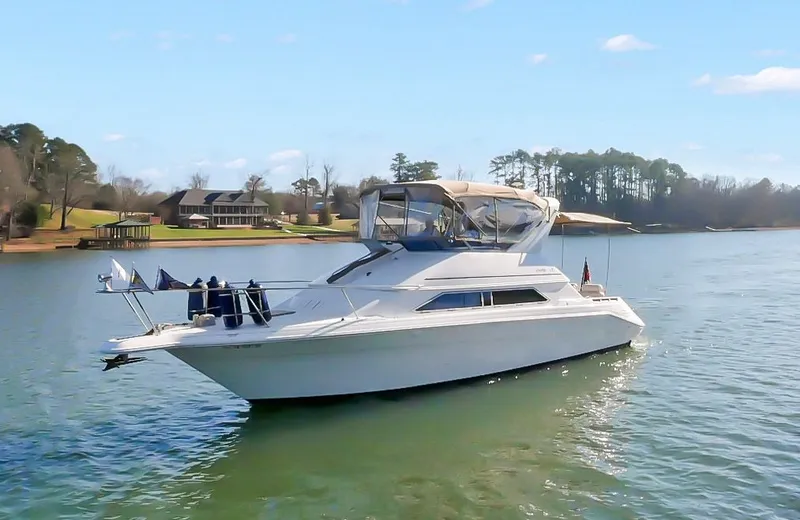 Slide: The Image of 1993 Sea Ray Express Bridge 350 on calm water. - 5