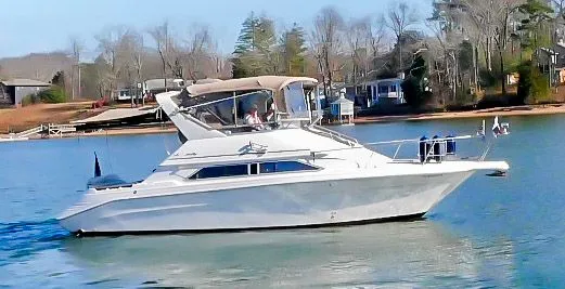 Slide: The Image of 1993 Sea Ray Express Bridge 350 on calm water. - 6