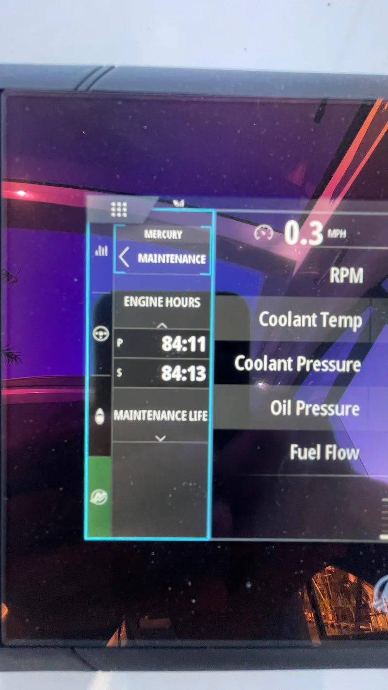 Slide: The Image of Evolve 400HT 2022 dashboard displaying engine hours and maintenance details. - 12