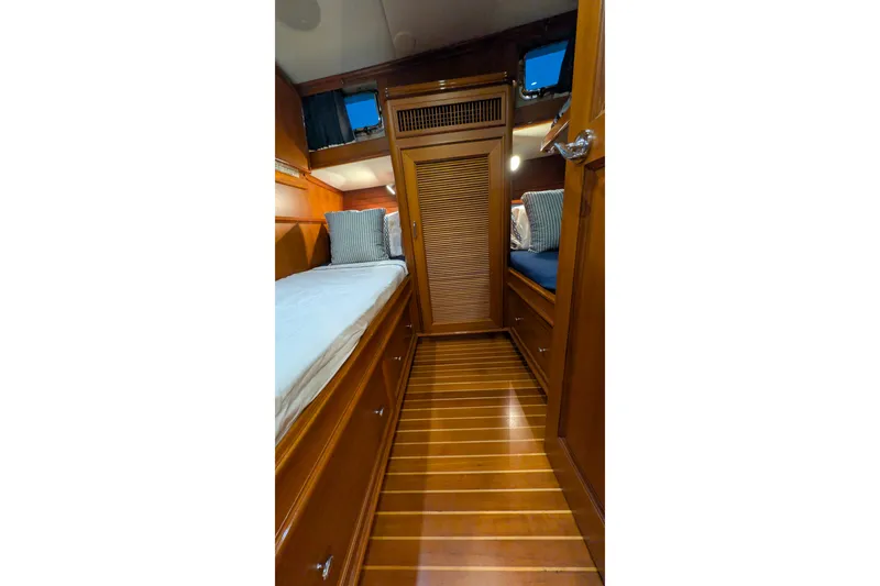 Slide: The Image of Luxurious wooden cabin interior of 2004 Grand Banks 58 Eastbay FB yacht. - 13