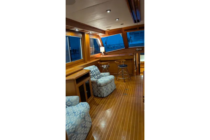 Slide: The Image of Luxurious interior of 2004 Grand Banks 58 Eastbay FB yacht with elegant wood finish. - 19