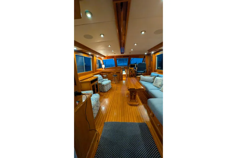 Slide: The Image of Luxurious interior of 2004 Grand Banks 58 Eastbay FB yacht with elegant wood finishes. - 32