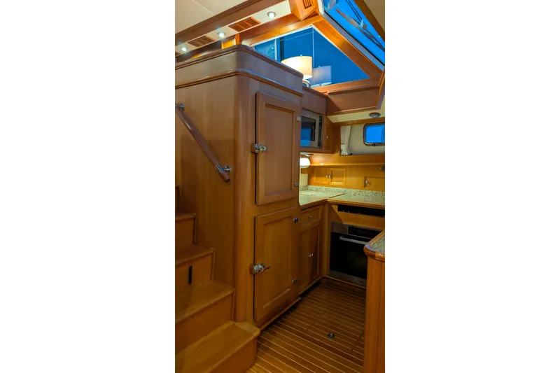 Slide: The Image of Luxurious wooden interior of 2004 Grand Banks 58 Eastbay FB yacht kitchen. - 35