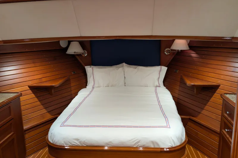 Slide: The Image of Luxurious cabin interior of 2004 Grand Banks 58 Eastbay FB yacht with wooden paneling. - 37