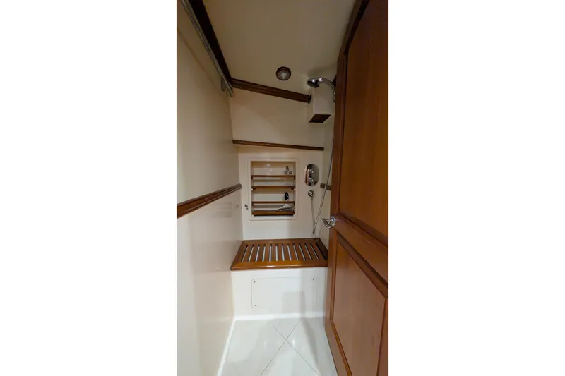 Slide: The Image of Shower area in 2004 Grand Banks 58 Eastbay FB yacht with wooden accents. - 8