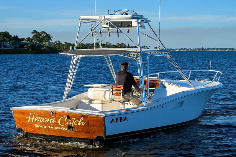 Slide: The Image of 1998 Aura 28 Tournament Series boat cruising on a sunny day in Boca Grande, Florida. - 46