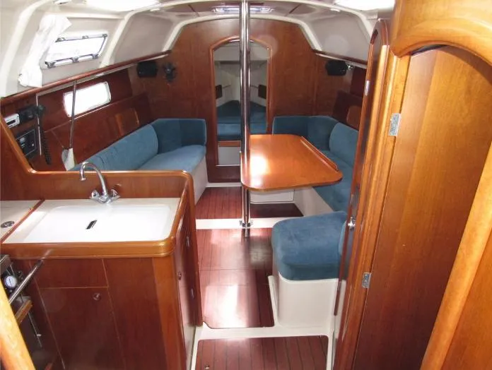 Slide: The Image of Interior of 1999 Beneteau Oceanis 321 yacht with wood finish. - 12