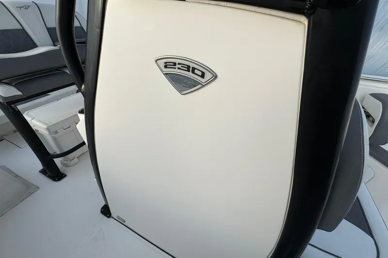 Slide: The Image of 2017 Tidewater 230 CC Adventure boat interior with logo detail. - 15