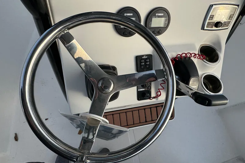 Slide: The Image of Steering console of 2017 Tidewater 230 CC Adventure boat with Yamaha controls. - 7