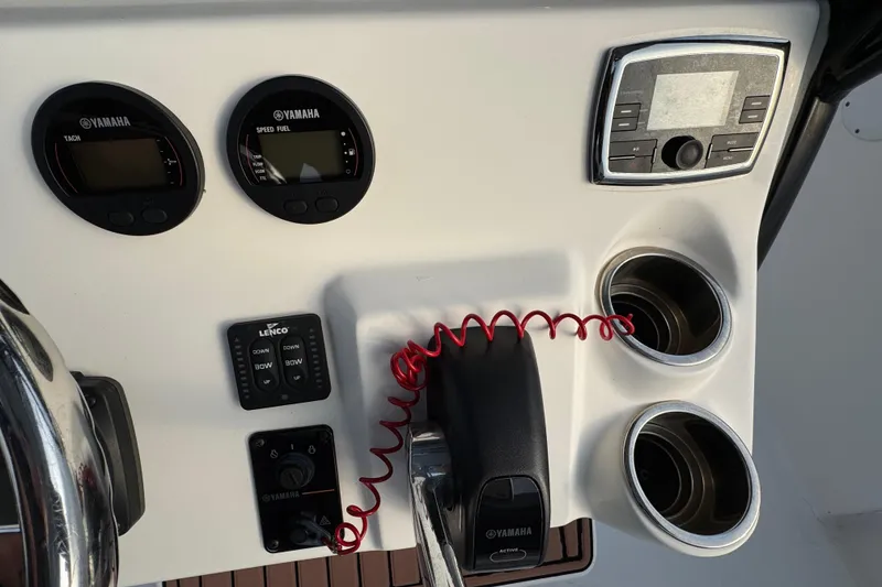 Slide: The Image of Control panel of 2017 Tidewater 230 CC Adventure boat with Yamaha gauges and controls. - 8