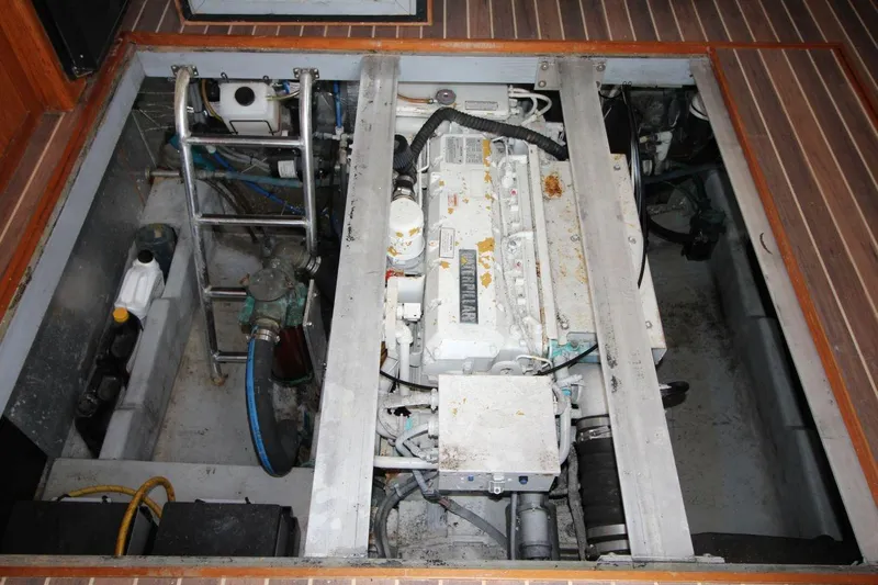 Slide: The Image of Close-up of a 2002 Mainship 390 Trawler's propeller in a circular housing. - 37