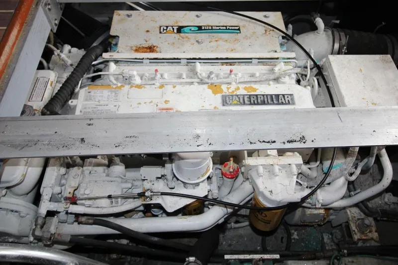 Slide: The Image of Caterpillar engine compliance labels on 2002 Mainship 390 Trawler, model 3126, serial 1ZJ02613. - 38
