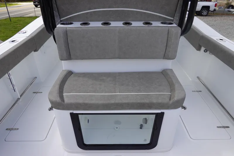 Slide: The Image of 2026 Sea Hunt Gamefish 28 Forward Seating with gray cushioned bench and storage compartment. - 15