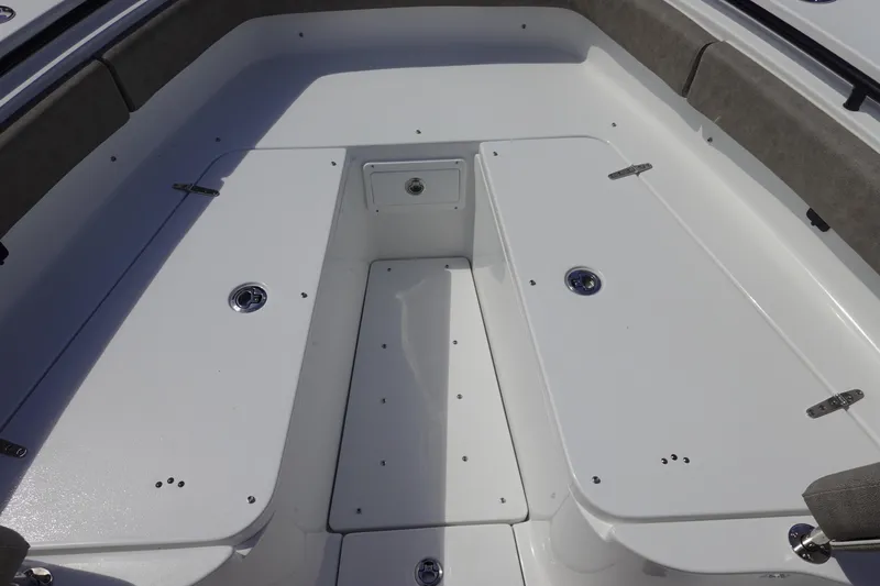 Slide: The Image of 2026 Sea Hunt Gamefish 28 Forward Seating, spacious deck with storage compartments. - 33