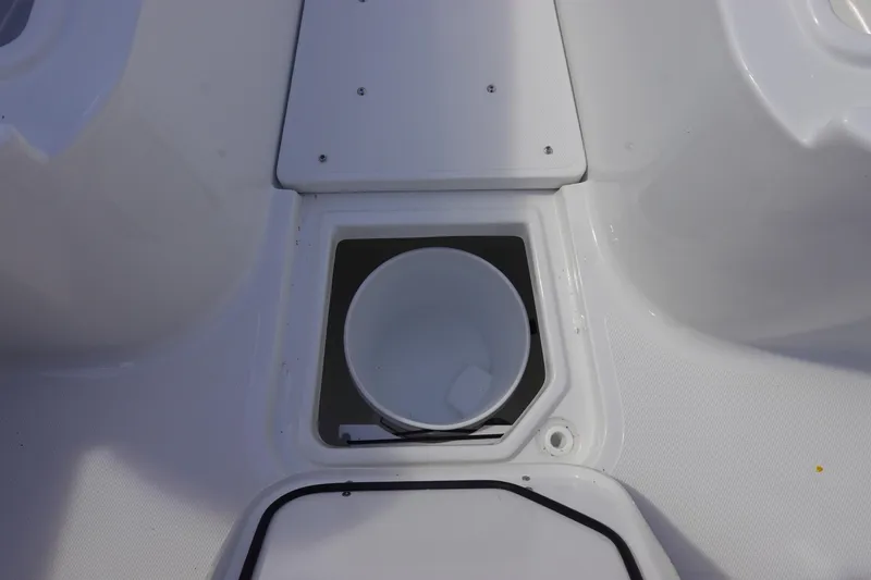 Slide: The Image of 2026 Sea Hunt Gamefish 28 Forward Seating boat interior with storage compartment. - 36