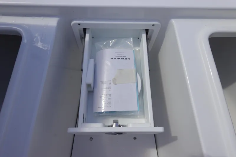 Slide: The Image of Storage compartment on 2026 Sea Hunt Gamefish 28 Forward Seating boat. - 37