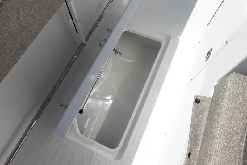 Slide: The Image of Open storage compartment on 2026 Sea Hunt Gamefish 28 Forward Seating boat. - 47