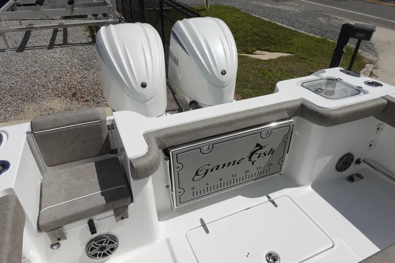 Slide: The Image of 2026 Sea Hunt Gamefish 28 boat with dual engines and forward seating. - 8