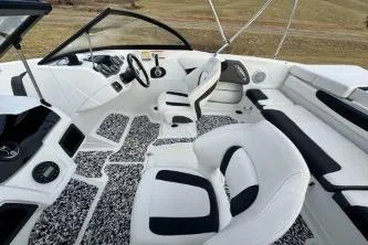 Slide: The Image of 2022 Tahoe 200 S boat interior with spacious seating and modern design. - 13