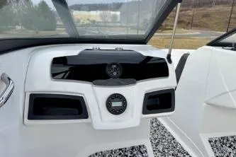 Slide: The Image of Close-up of a 2022 Tahoe 200 S boat hull with visible scratches. - 14