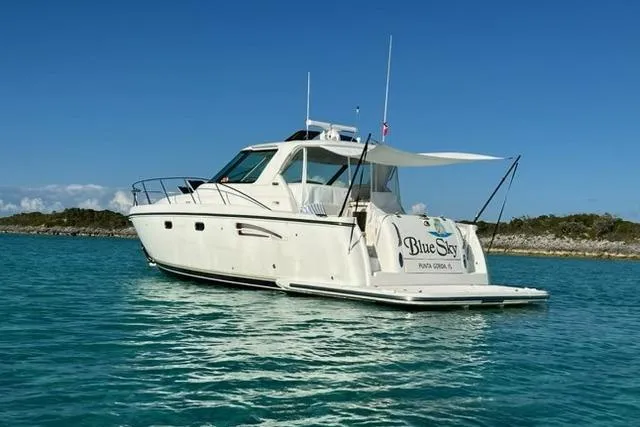 The Image of 2006 Tiara Yachts 3600 Sovran in serene blue waters under clear sky. - 0