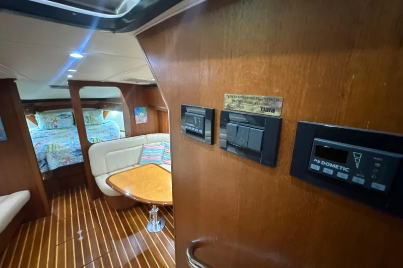 Slide: The Image of 2006 Tiara Yachts 3600 Sovran interior with cozy seating and modern controls. - 29