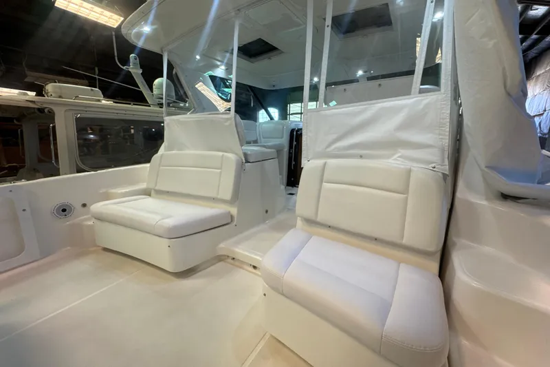 Slide: The Image of 2006 Tiara Yachts 3600 Sovran interior with white seating and modern design. - 52