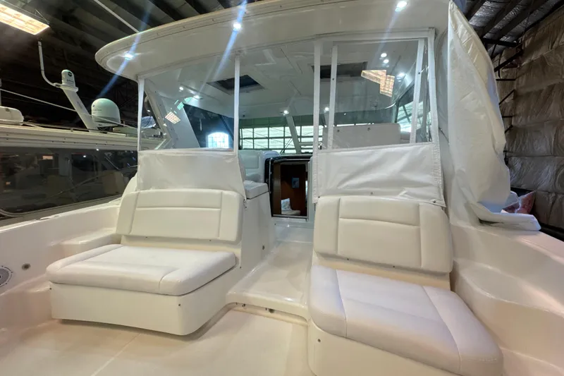 Slide: The Image of 2006 Tiara Yachts 3600 Sovran interior with white seating and modern design. - 53