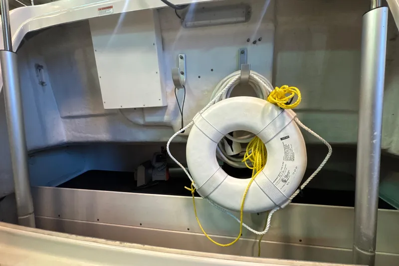Slide: The Image of Life ring on 2006 Tiara Yachts 3600 Sovran, secured with yellow rope. - 58