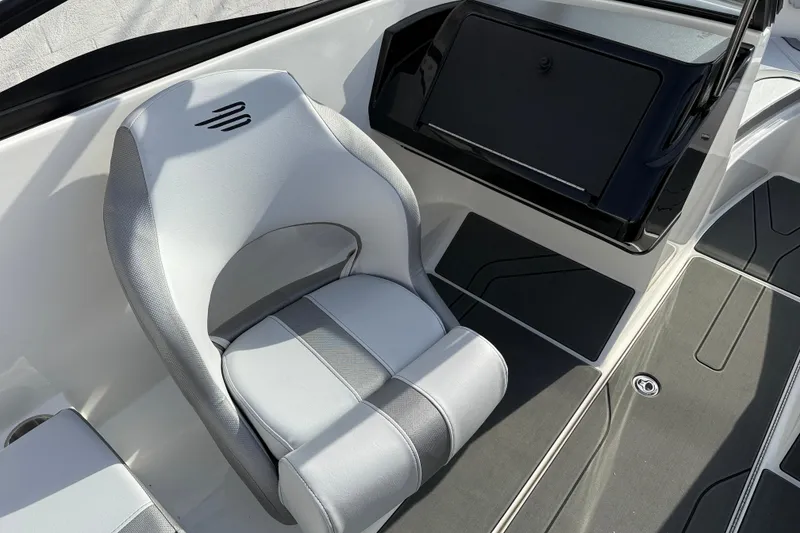 Slide: The Image of 2026 Bayliner V20 boat interior with sleek seating and modern design. - 10