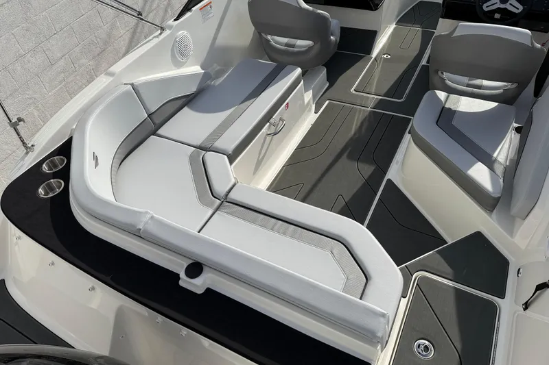 Slide: The Image of 2026 Bayliner V20 boat interior with sleek seating and modern design. - 4