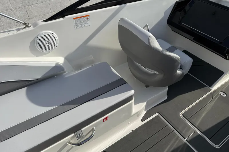 Slide: The Image of Interior of 2026 Bayliner V20 boat with seating and speaker. - 9