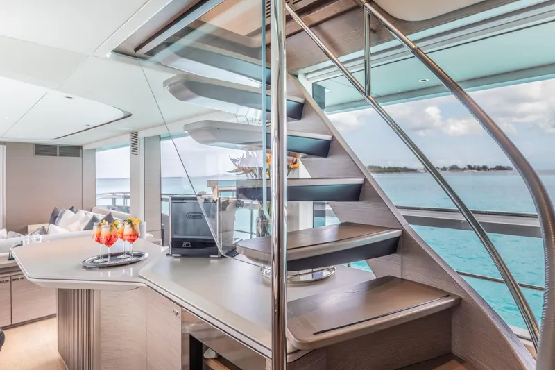 Slide: The Image of Luxurious interior of 2023 Princess X95 yacht with modern staircase and ocean view. - 103
