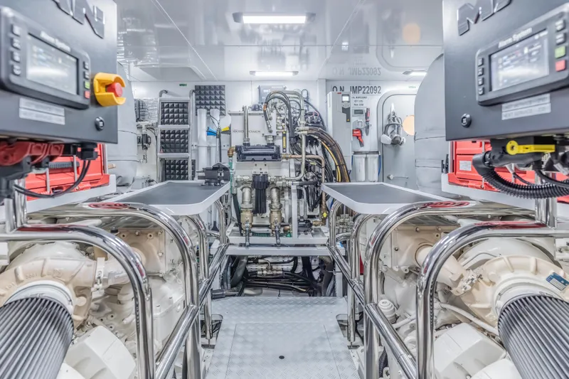 Slide: The Image of Engine room of 2023 Princess X95 yacht, showcasing advanced machinery and control systems. - 122