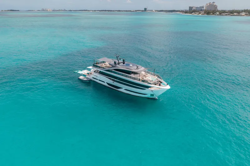 Slide: The Image of Luxurious 2023 Princess X95 yacht cruising in clear turquoise waters. - 15