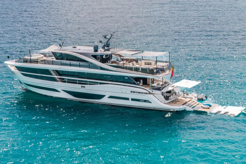 Slide: The Image of Luxurious 2023 Princess X95 yacht cruising on clear blue ocean waters. - 16