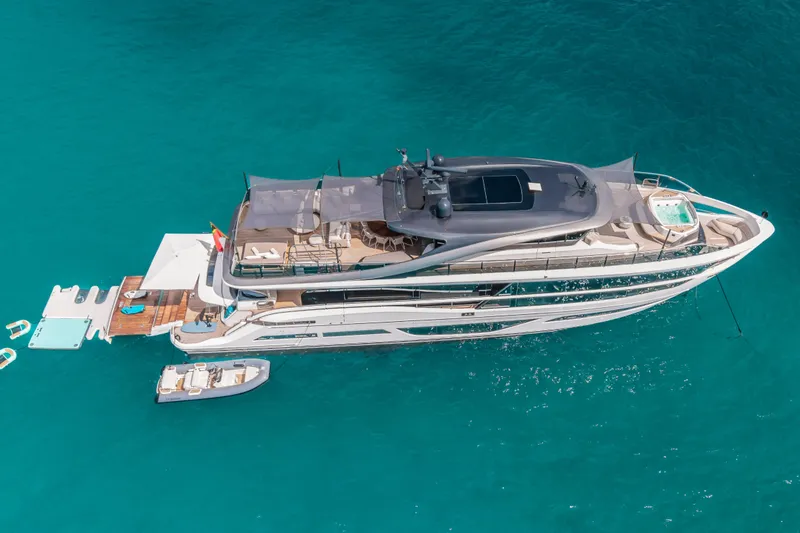 Slide: The Image of Aerial view of 2023 Princess X95 yacht on turquoise water. - 25